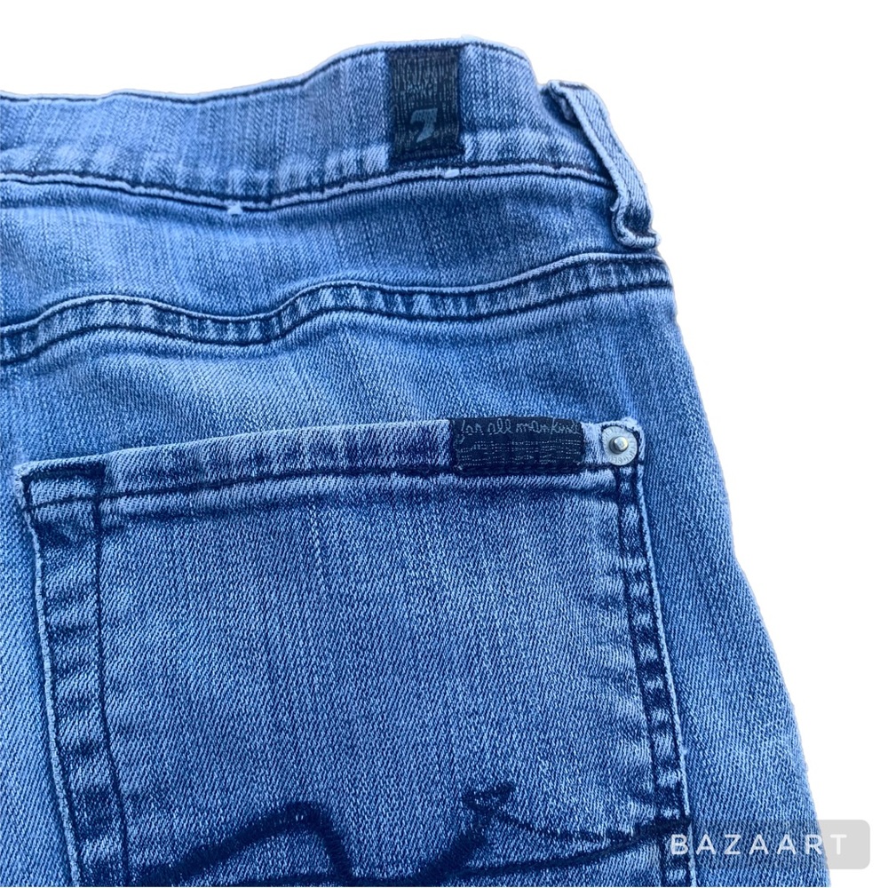 7 For all Mankind button fly, bootleg jeans. Approx a size 10-Size 31 on tag